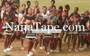 African Girl Displaying Breast During Festival